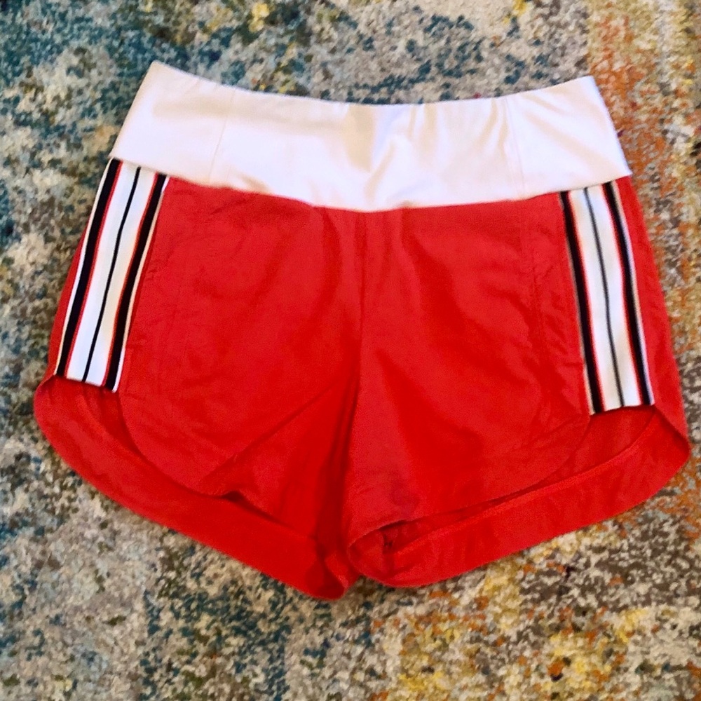 Athleta red shorts with racer stripes EUC size 4